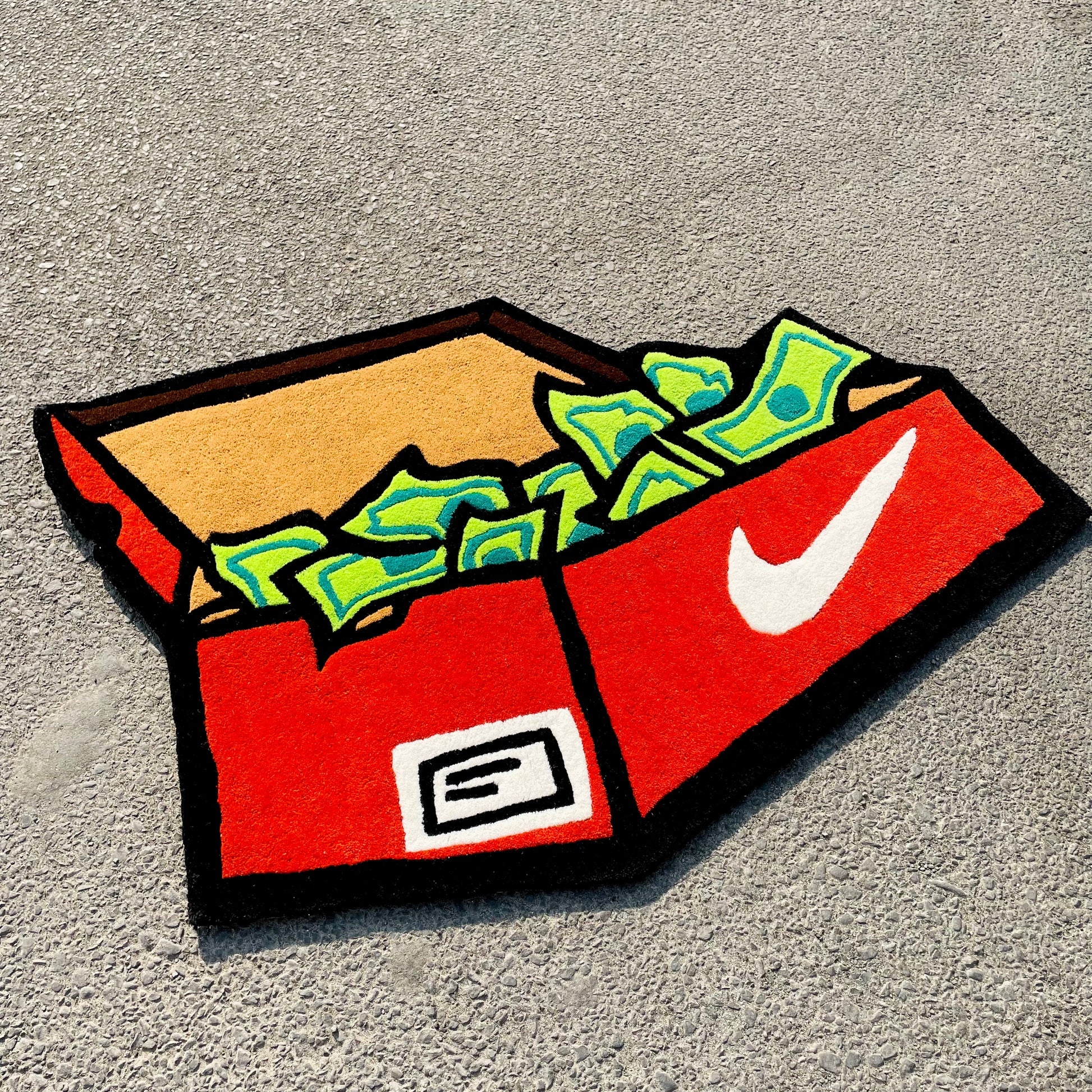 Nike Box Stashed Hand-Tufted Rug low angle view