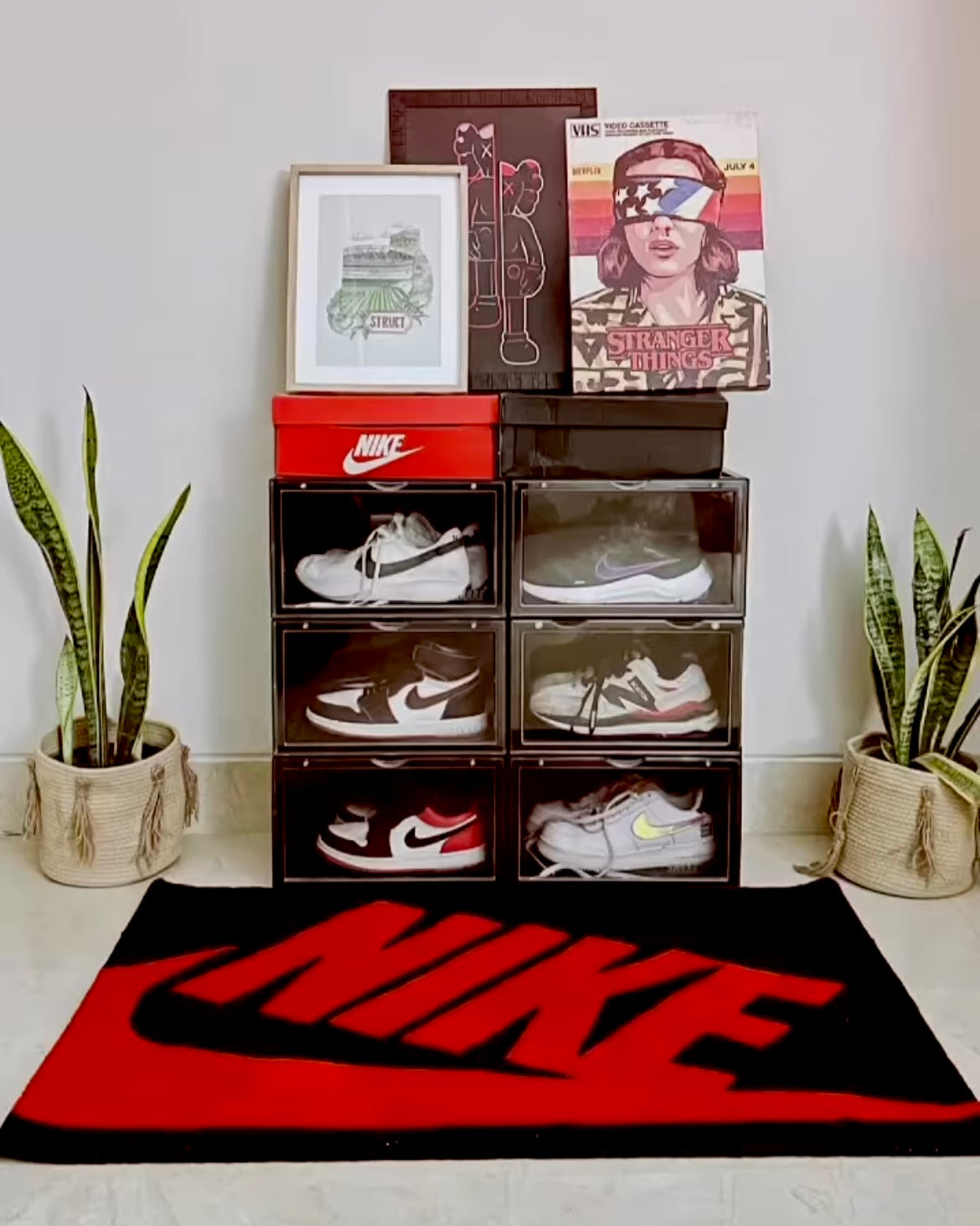 Nike Red and Black Hand-Tufted Rug in front of sneaker crates
