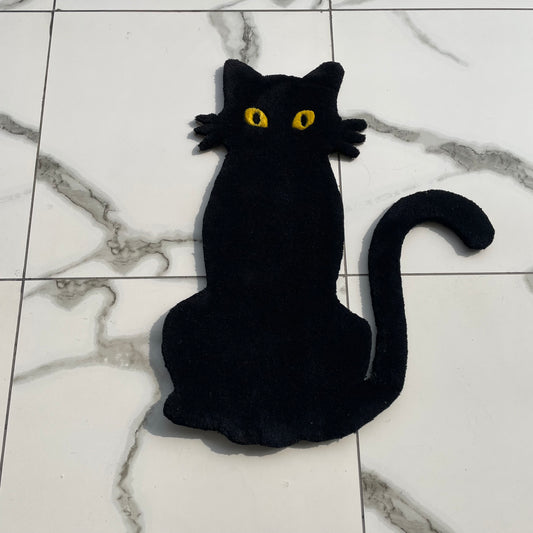 Black cat rug 