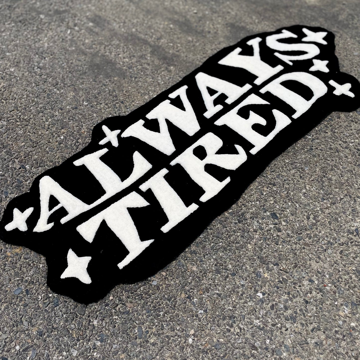 Side view of always tired rug