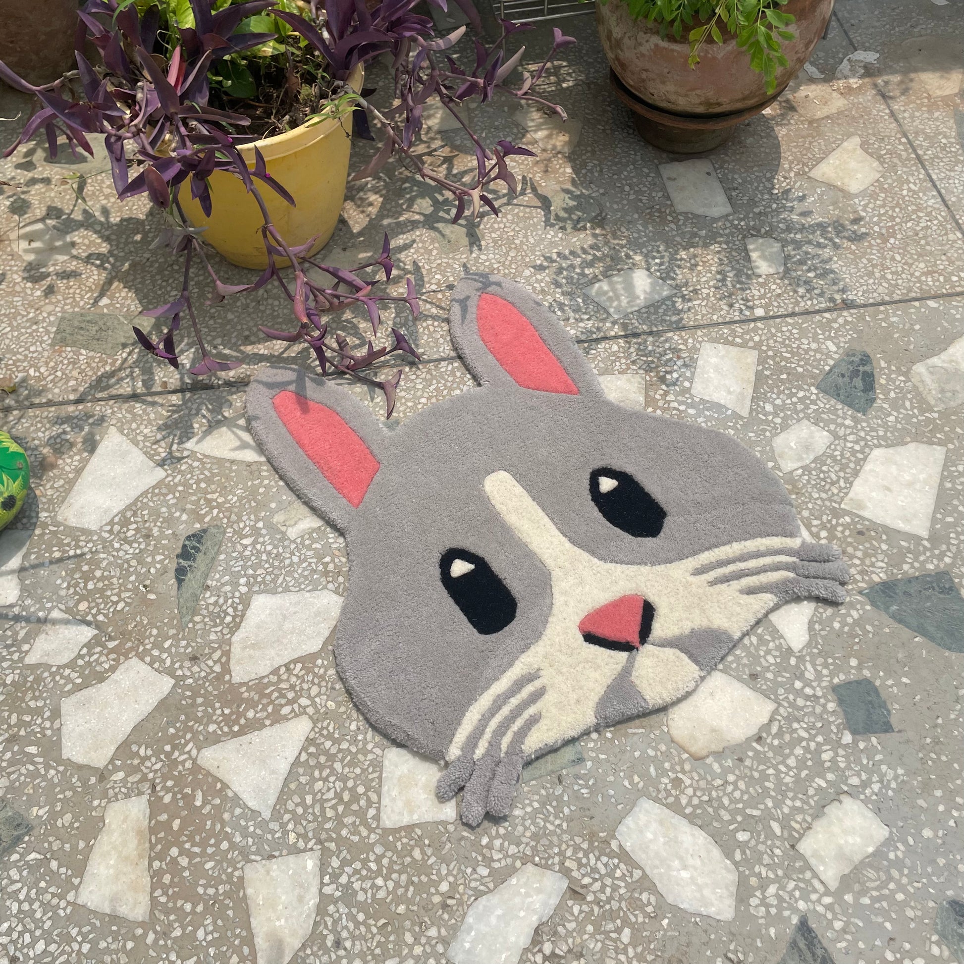 Bunny emoji rug side view
