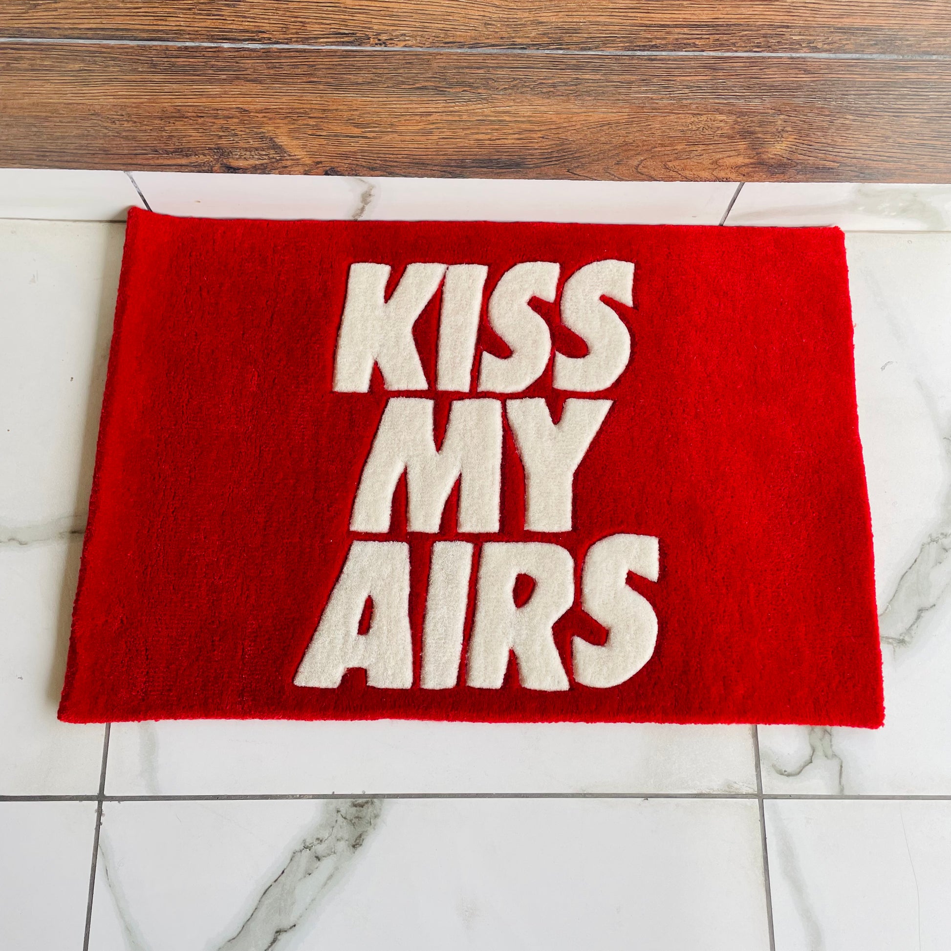 Kiss My Airs Hand-Tufted Rug red