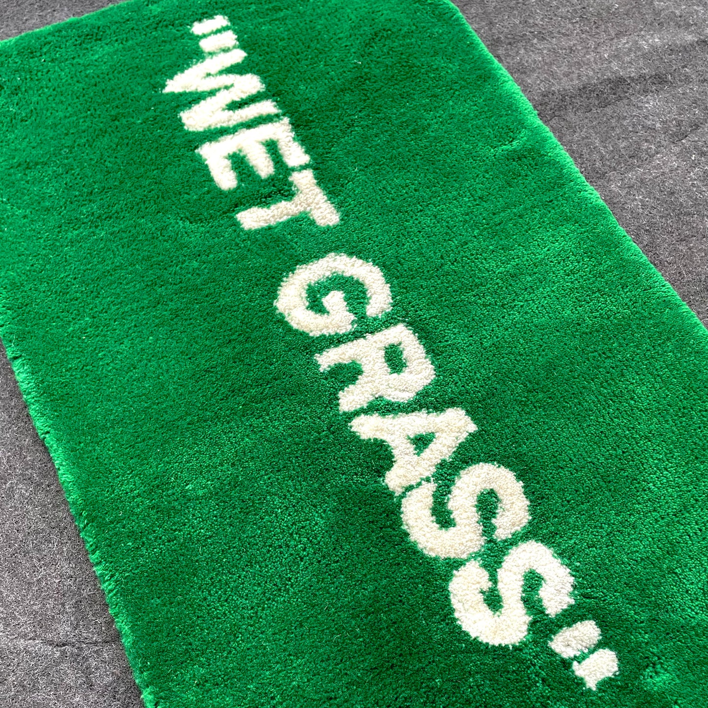 wet grass rug close up
