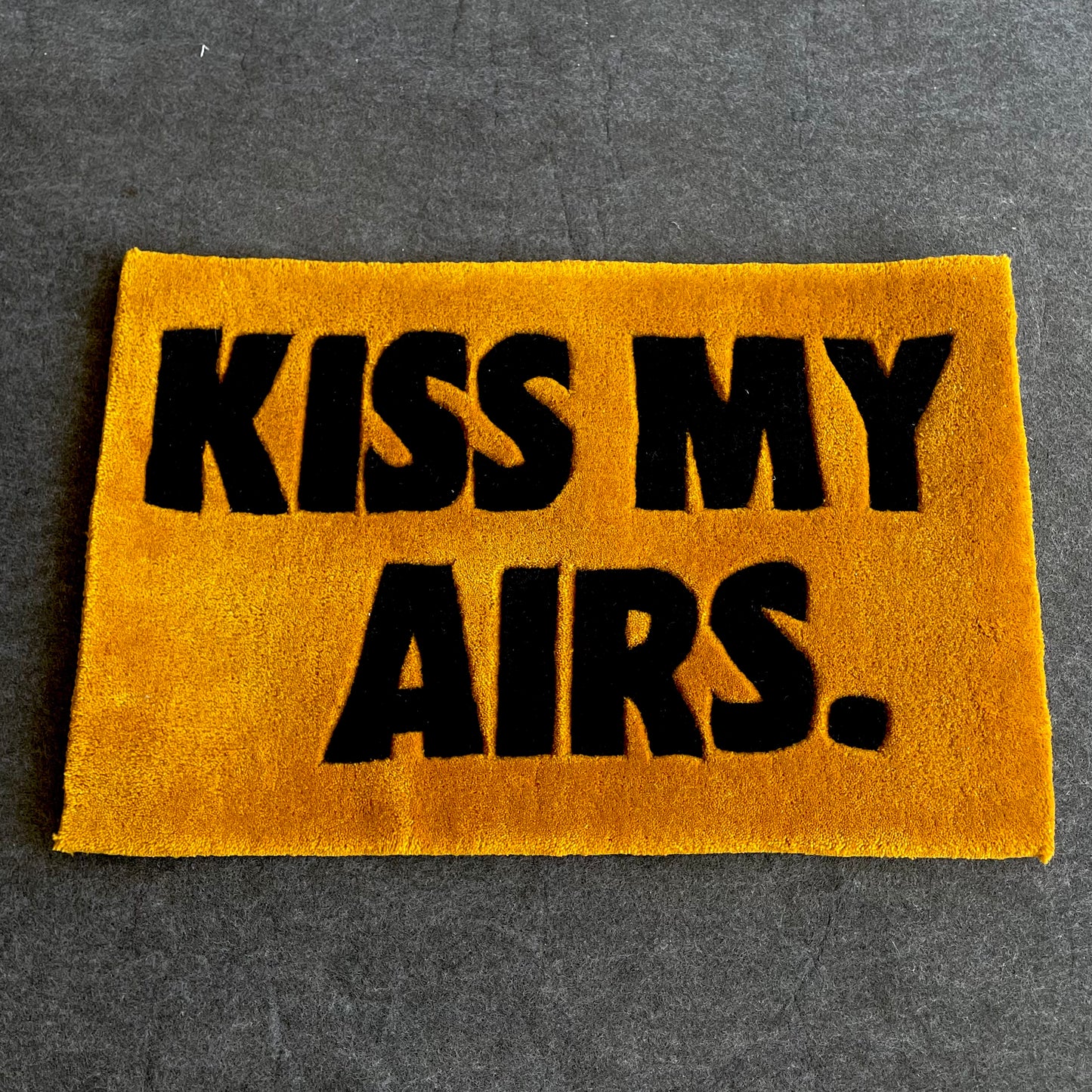 Kiss My Airs Hand-Tufted Rug gold