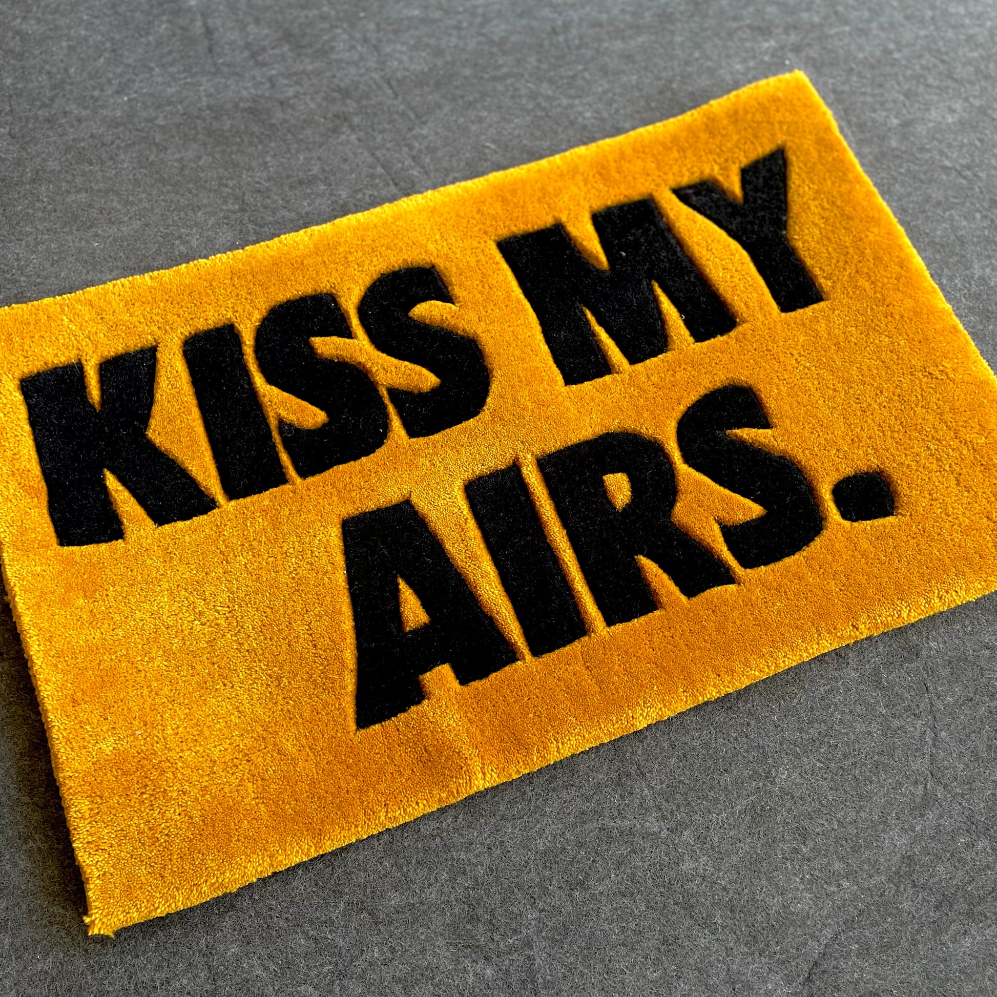 Kiss My Airs Hand-Tufted Rug gold