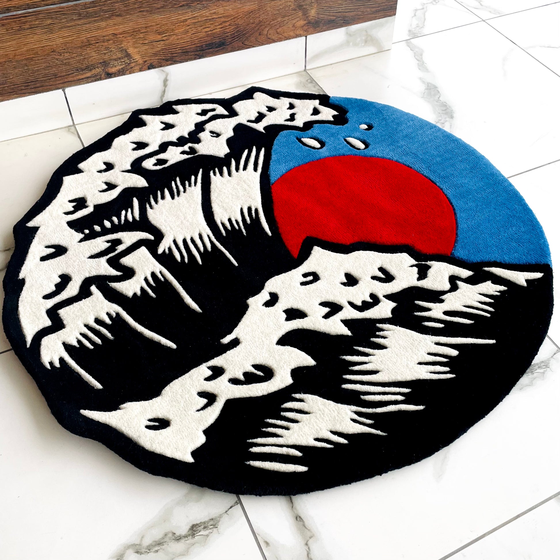 Great Wave Off Kanagawa Hand-Tufted Rug on white marble floor