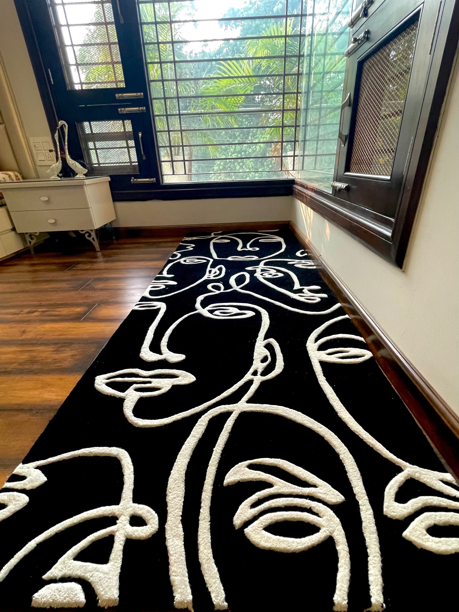 Abstract Faces Hand-Tufted rug- low angle photo
