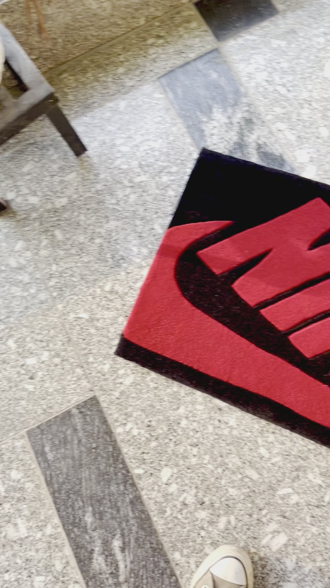 Nike Red and Black Hand-Tufted Rug detailed view